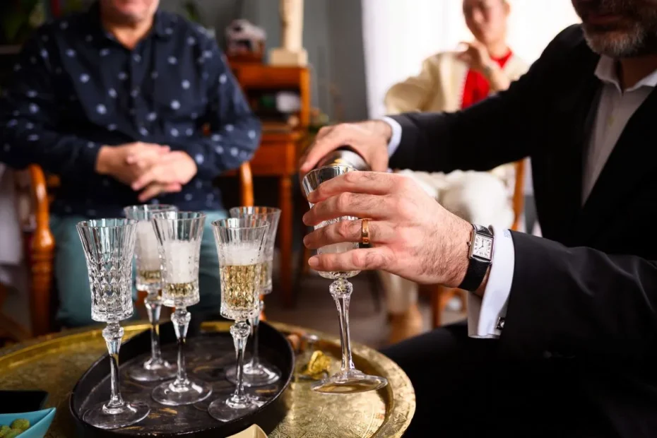 Serving champagne during a family Christmas in Provence