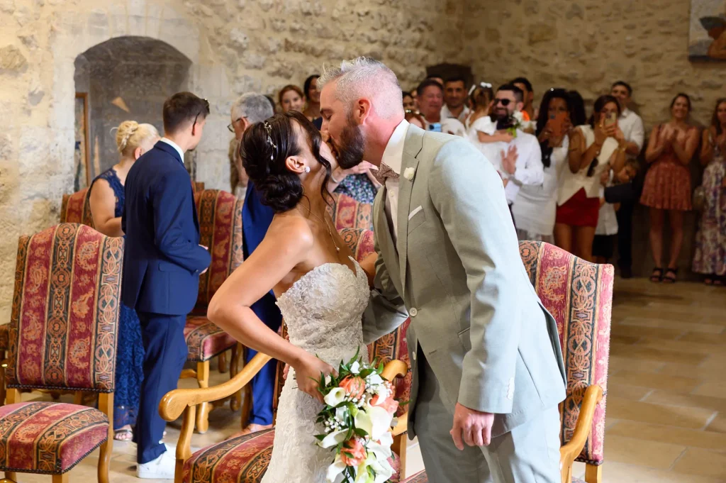 The couple seeing each other at Trets town hall, they kiss during the civil wedding ceremony